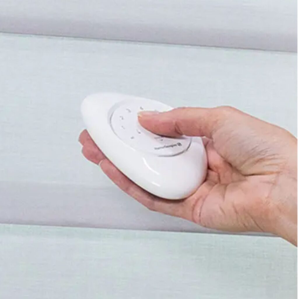 Hunter Douglas PowerView remote in a pebble