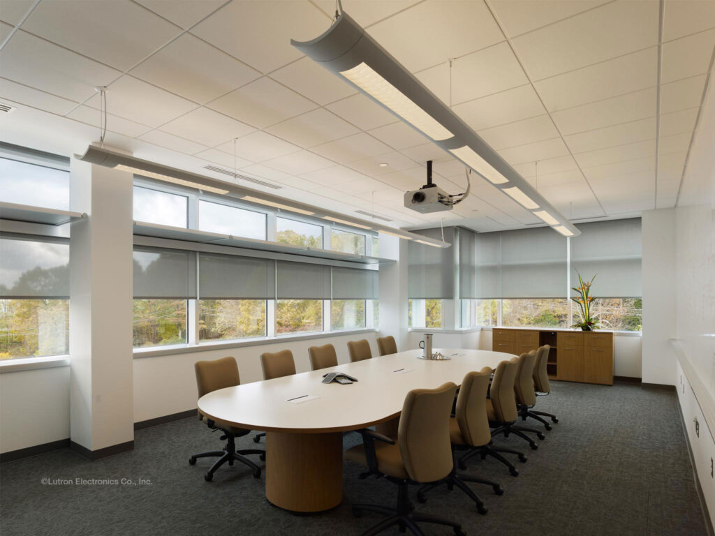 Professional commercial window treatments installed in a modern office space, featuring manual and motorized blinds, high-quality materials, and expert workmanship.
